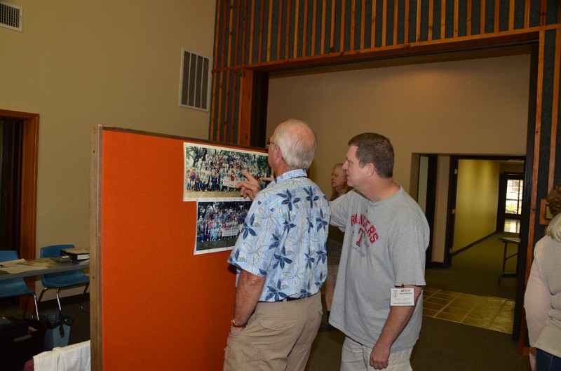 DSC_0328.JPG - Looking at past years' group photos.